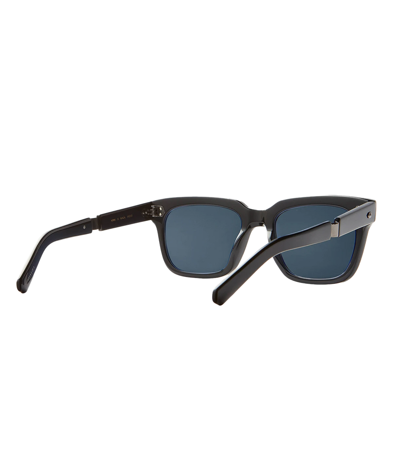 A modern take on a country club classic, the Arnie sunglasses by Mr Light feature a sleek acetate frame with titanium components and intricate filigree at the temples. Handcrafted in Japan with optical-quality CR39 lenses for superior clarity and UV protection.