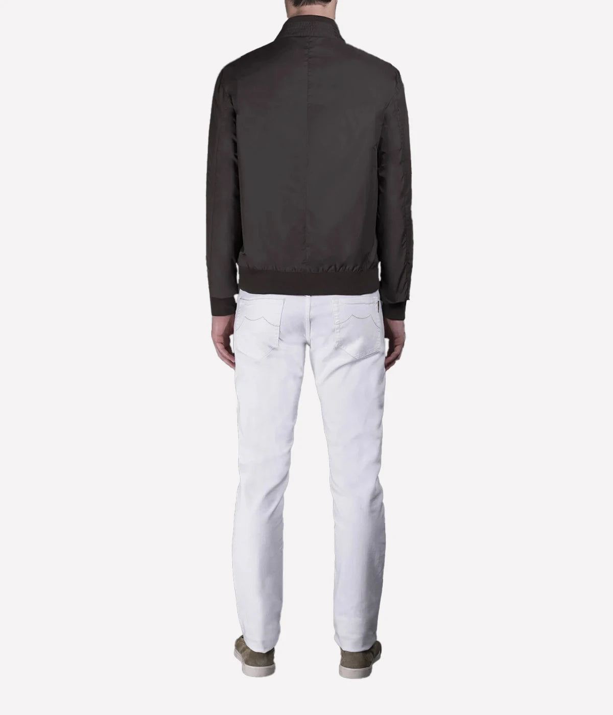 Forest/mud reversible bomber jacket made in Italy, featuring one side in water-repellent sharp memory fabric and the other in iridescent taffeta gabardine. Finished with a knit collar, cuffs, and hem, reversible metal zipper, and zippered side pockets.