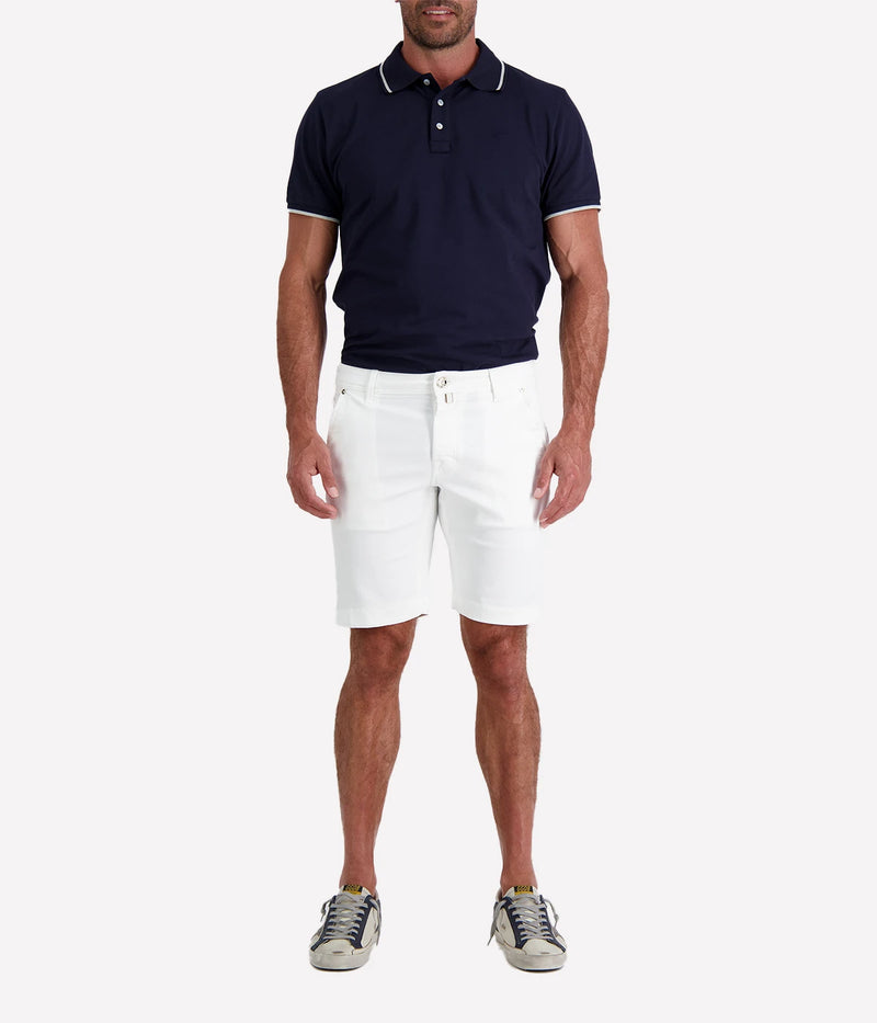 Jacob Cohen Lou Bermuda Shorts in a slim fit with a low waist, featuring a classic 5-pocket design and slant front pockets, crafted from a stretch cotton blend. Made in Italy.