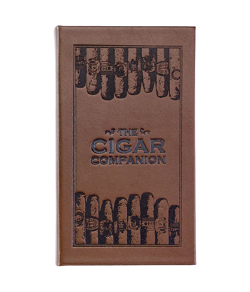 Luxury guide to handmade cigars, featuring 224 pages on cigar history, brands, and tasting techniques with full-colour photography.