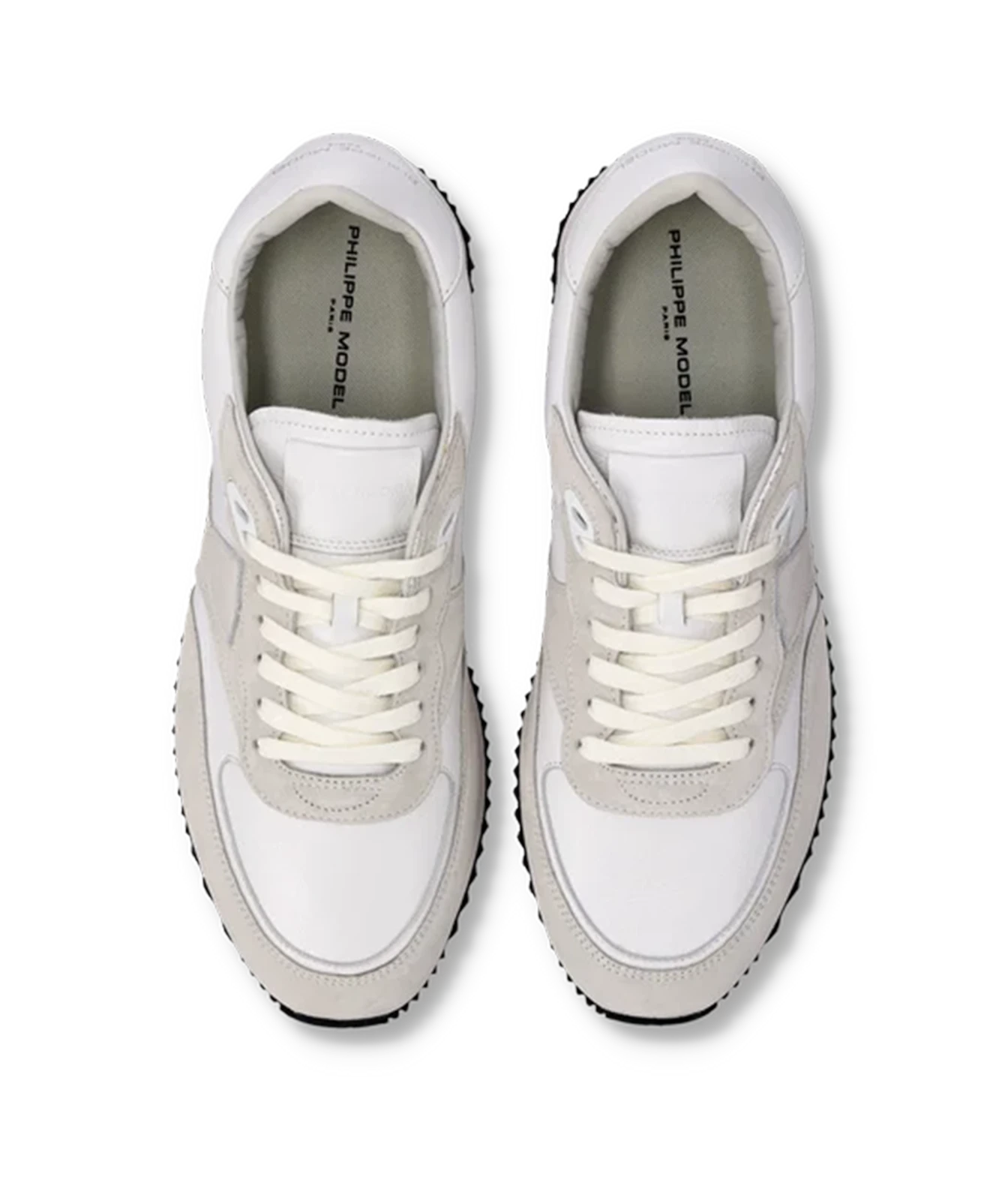 A pair of white and light gray low-top sneakers shown from a top-down view on a plain white background. The brand name 'PHILIPPE MODEL PARIS' is printed on the inner sole of each shoe.