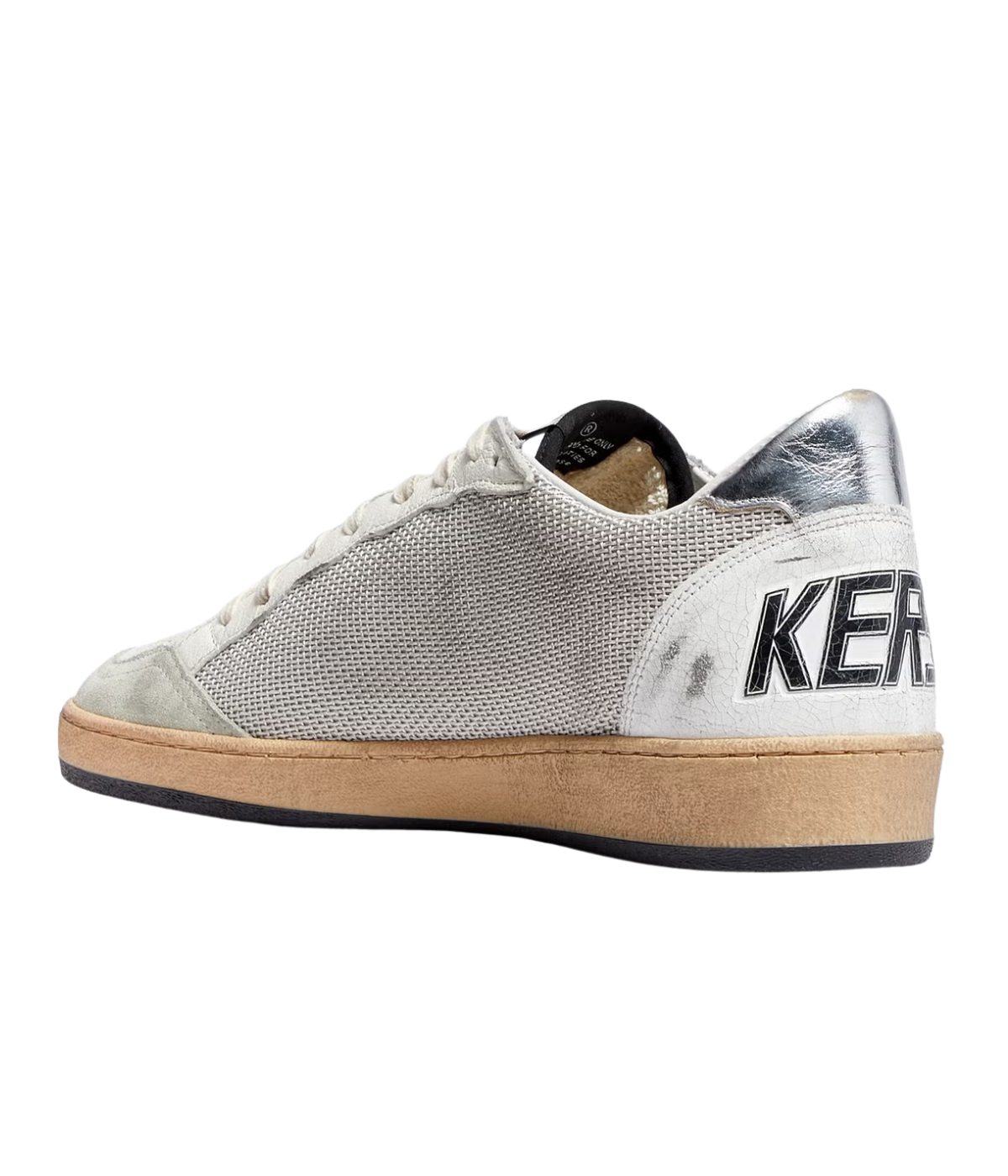 Golden Goose Ball Star sneakers in light silver with black leather star and heel tab, featuring distressed detailing, net upper, and rubber sole for a vintage American college look.