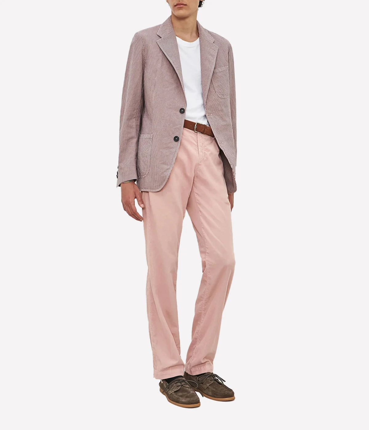 Deconstructed cotton-linen jacket with a two-button front, patch pockets, and dark horn buttons.