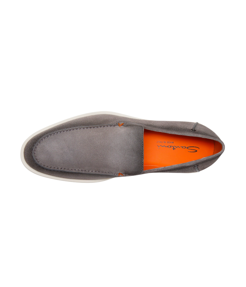 Men's grey suede Santoni loafers with apron stitching, orange detailing, and a smooth rubber sole—crafted in Italy for understated elegance.