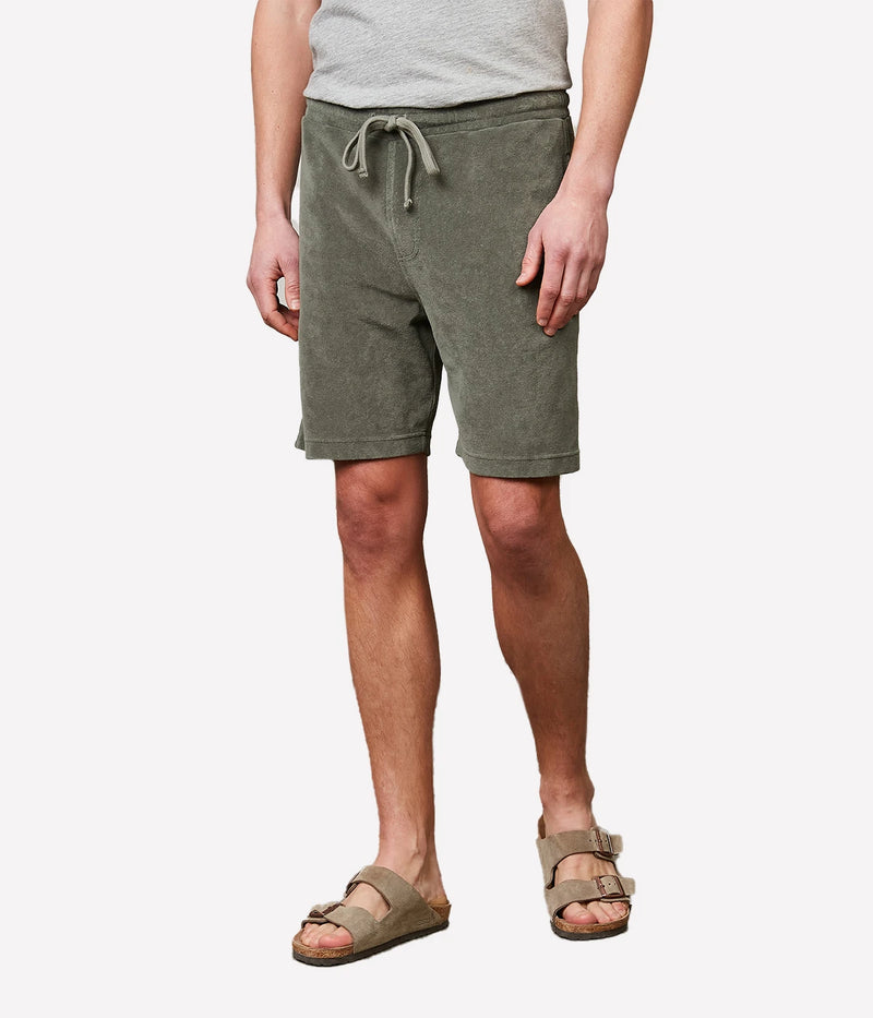 Military green Bouclette Bermuda shorts made from soft cotton terry towelling, featuring a drawstring waist and side pockets for casual comfort