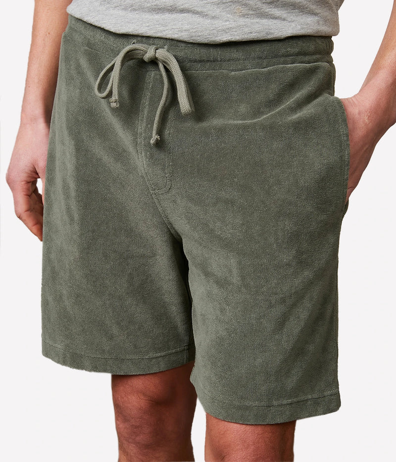 Military green Bouclette Bermuda shorts made from soft cotton terry towelling, featuring a drawstring waist and side pockets for casual comfort
