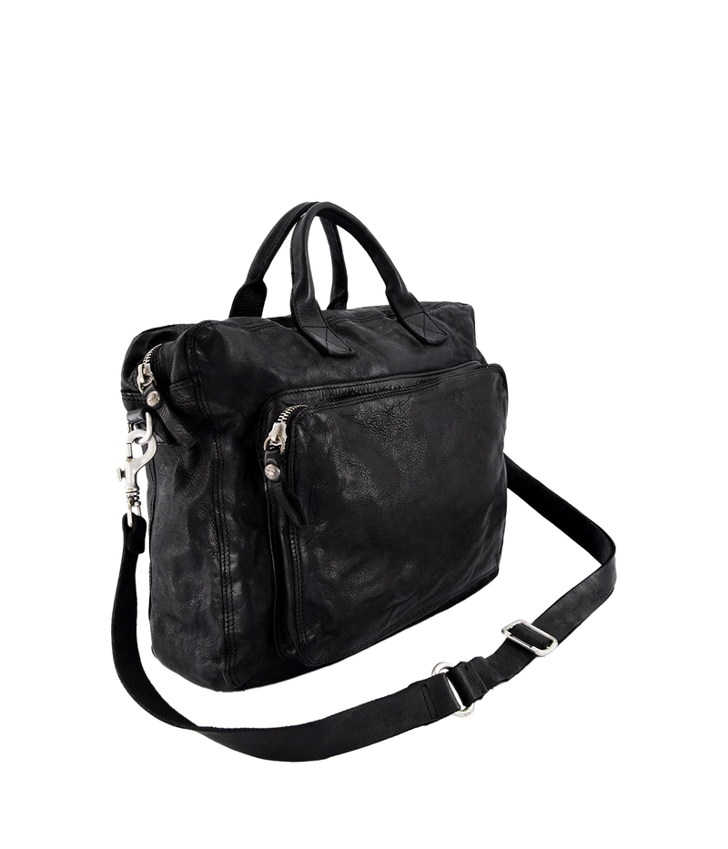 The Campomaggi Leather Briefcase in black is crafted from full-grain Italian leather with a rich, hand-dyed finish. Featuring sturdy top handles, a detachable shoulder strap, and a spacious interior, it’s a timeless blend of function and craftsmanship, perfect for work or travel.