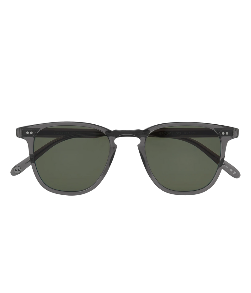 Square acetate sunglasses with keyhole bridge, premium glass lenses, and hand-finished details. Features classic GLCO core wire, 5-barrel hinges with rivets, and external pins at the temples. 100% UV protection.