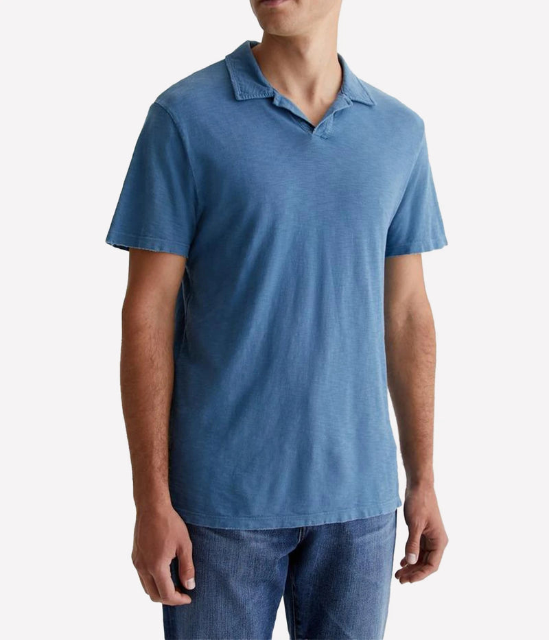 A timeless everyday basic polo shirt, in a ocean blue colourway, with collar detail and short sleeves. 100% cotton, comfortable polo, everyday basic, throw on and go, made in USA. 