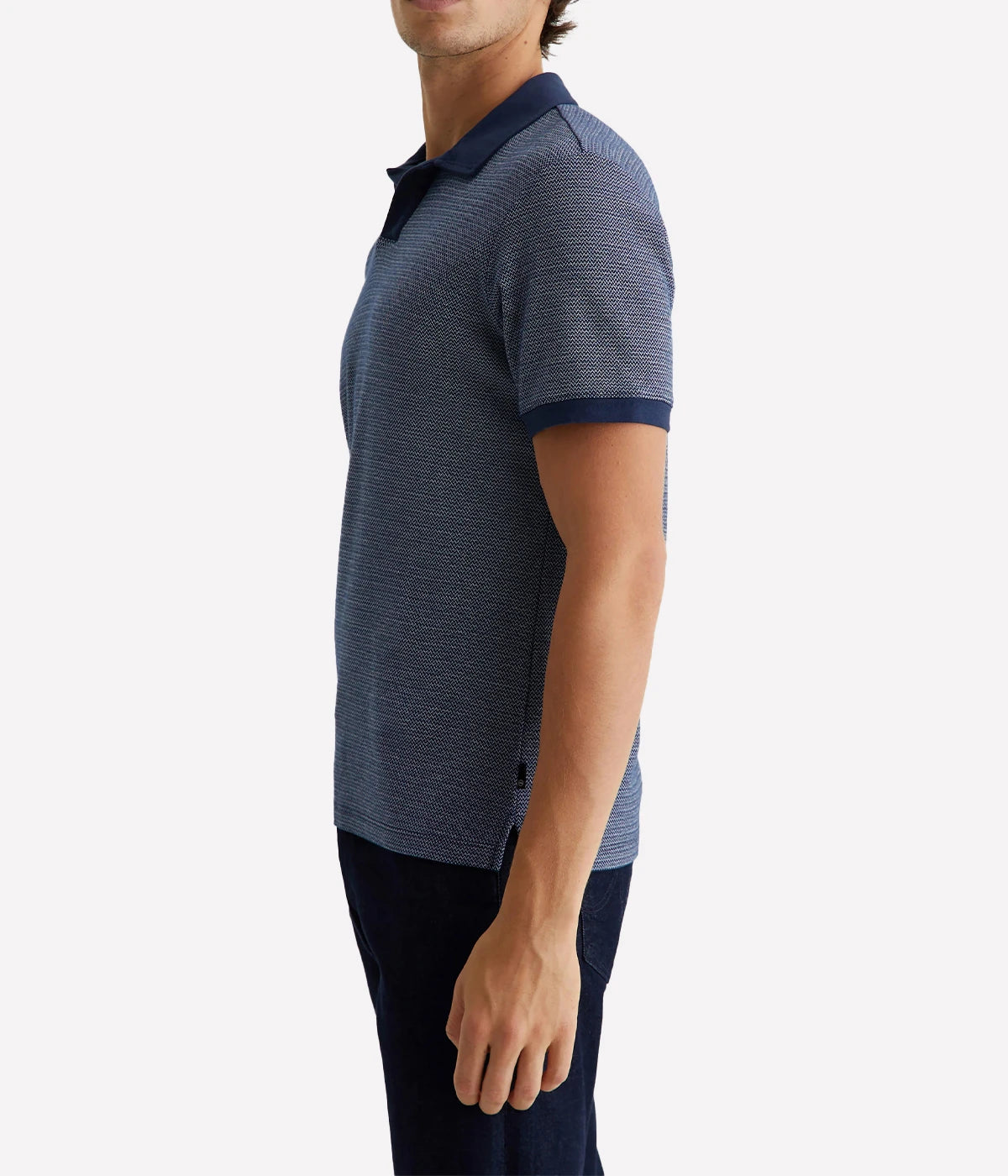 Side profile of the Bryce Johnny Collar polo shirt, showcasing the relaxed fit and smooth finish of the lightweight cotton jersey.