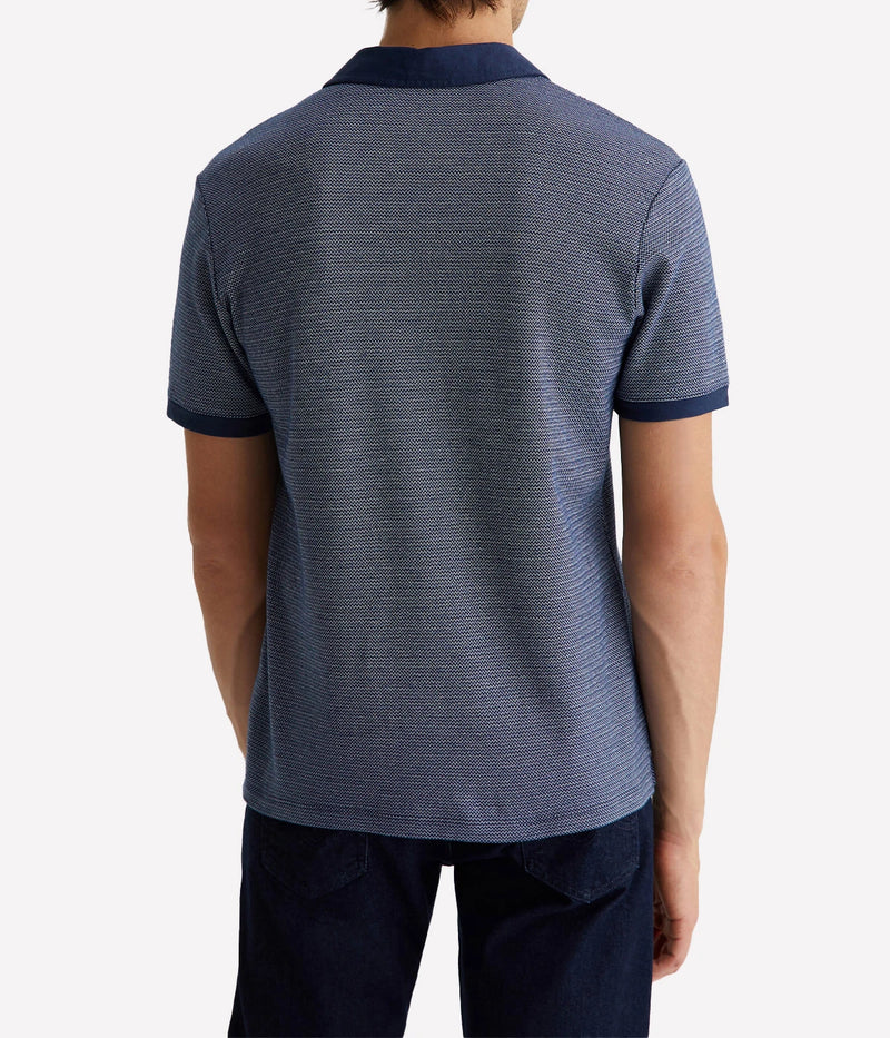 Rear view of the Bryce Johnny Collar polo shirt, highlighting its streamlined silhouette and soft cotton fabric.