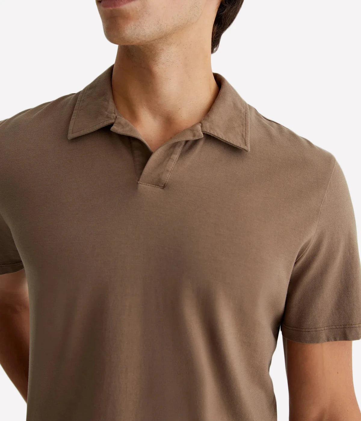 Close-up of the Bryce Johnny Collar polo shirt, focusing on the finely crafted collar and soft texture of the cotton fabric.