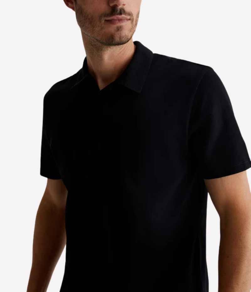 Front view of the AG Bryce Johnny Collar Polo Shirt, crafted from soft and lightweight cotton jersey. The shirt features a relaxed neckline, pointed collar, and short sleeves, offering a timeless and versatile design suitable for casual or tailored looks.