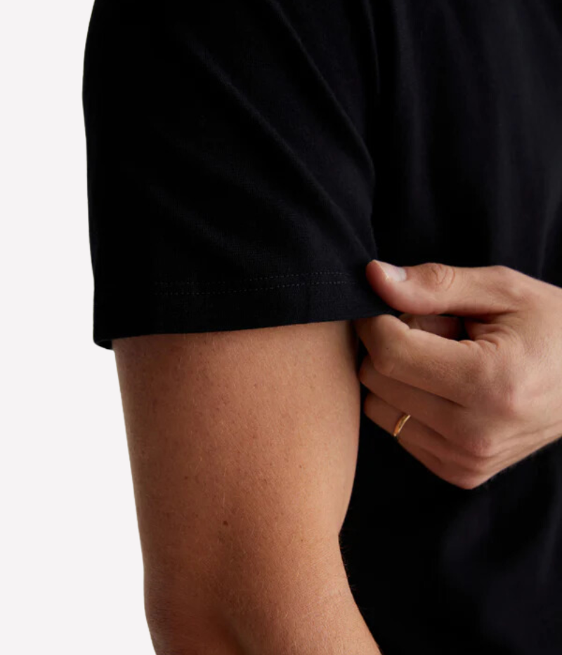 Close-up of the AG Bryce Johnny Collar Polo Shirt fabric, crafted from 100% cotton jersey. The lightweight, breathable material offers a soft feel and a relaxed drape, perfect for everyday wear.