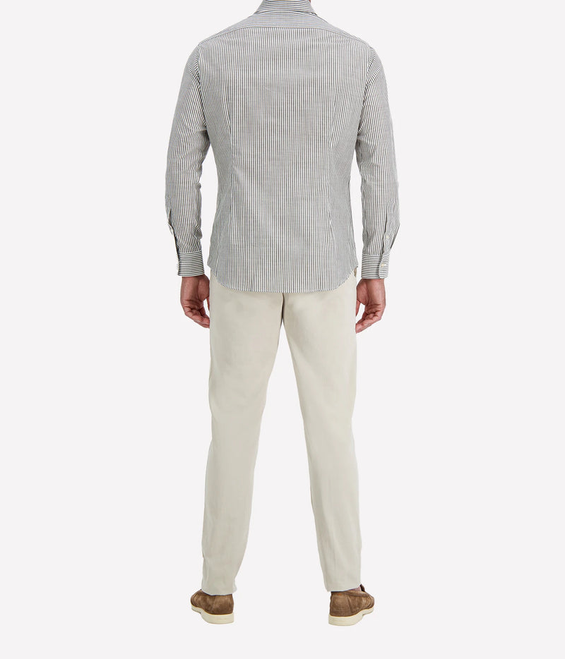 Back view of man wearing Ingram Slim Fit Shirt in Sage & White Stripe with stone chinos and brown suede shoes