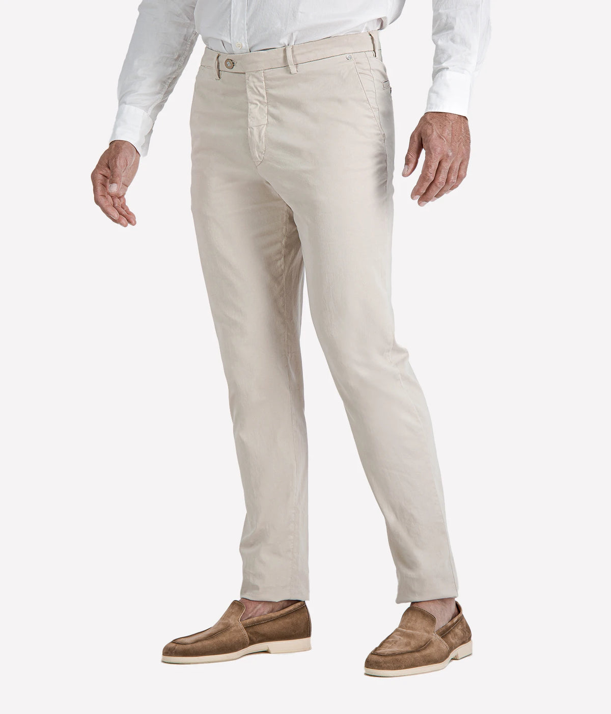 Man wearing Marco Pescarolo New York Cotton Silk Trouser in Beige with a white shirt and brown suede loafers, cropped front view