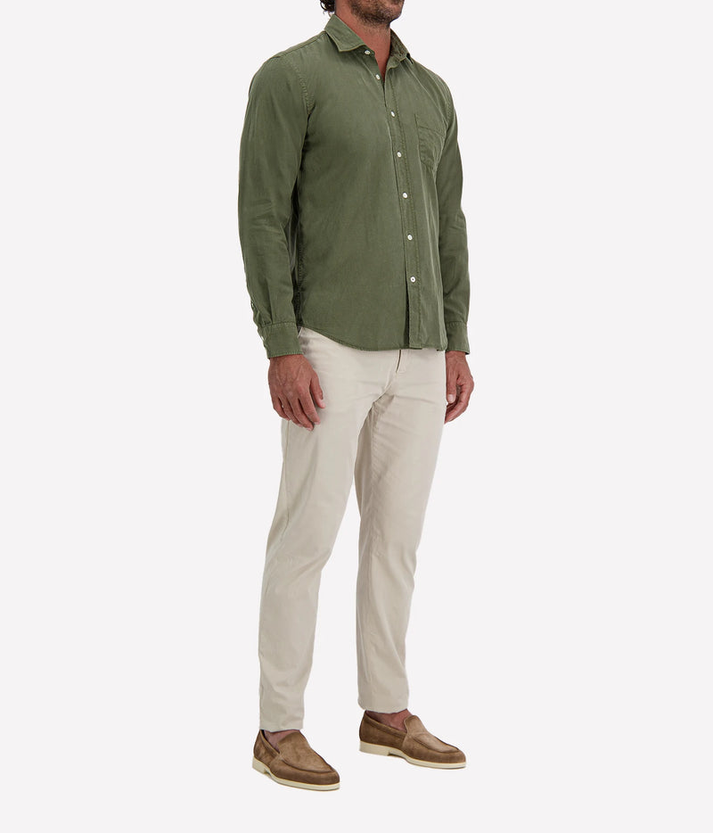 Man wearing Hartford Paul Tencel & Cotton Shirt in Military with stone chinos and brown suede shoes, three-quarter view