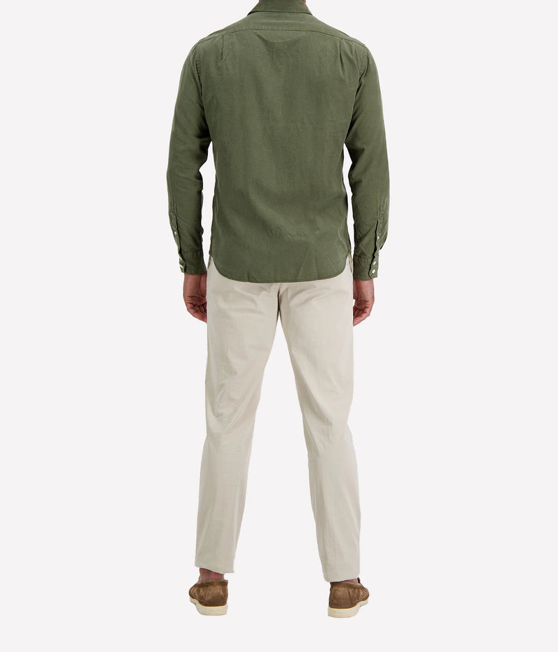 Back view of man wearing Hartford Paul Tencel & Cotton Shirt in Military with stone chinos and brown suede shoes
