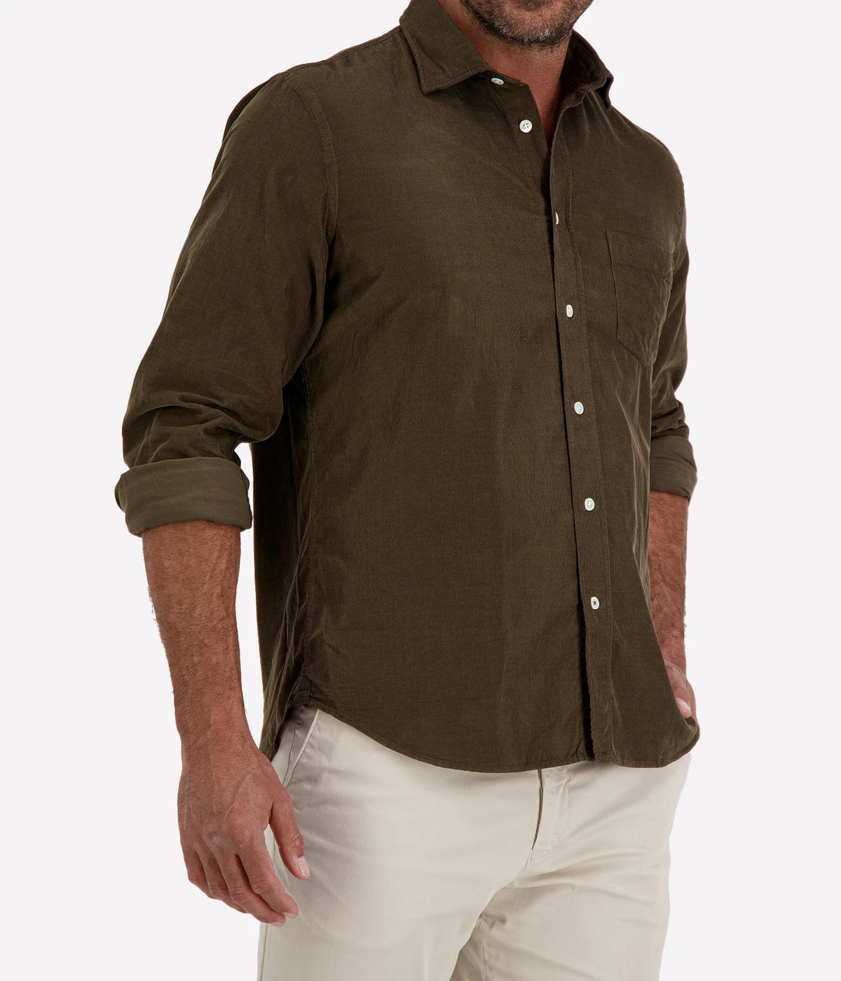 Man wearing Hartford Paul Fine Corduroy Shirt in Olive with stone chinos, cropped angled front view