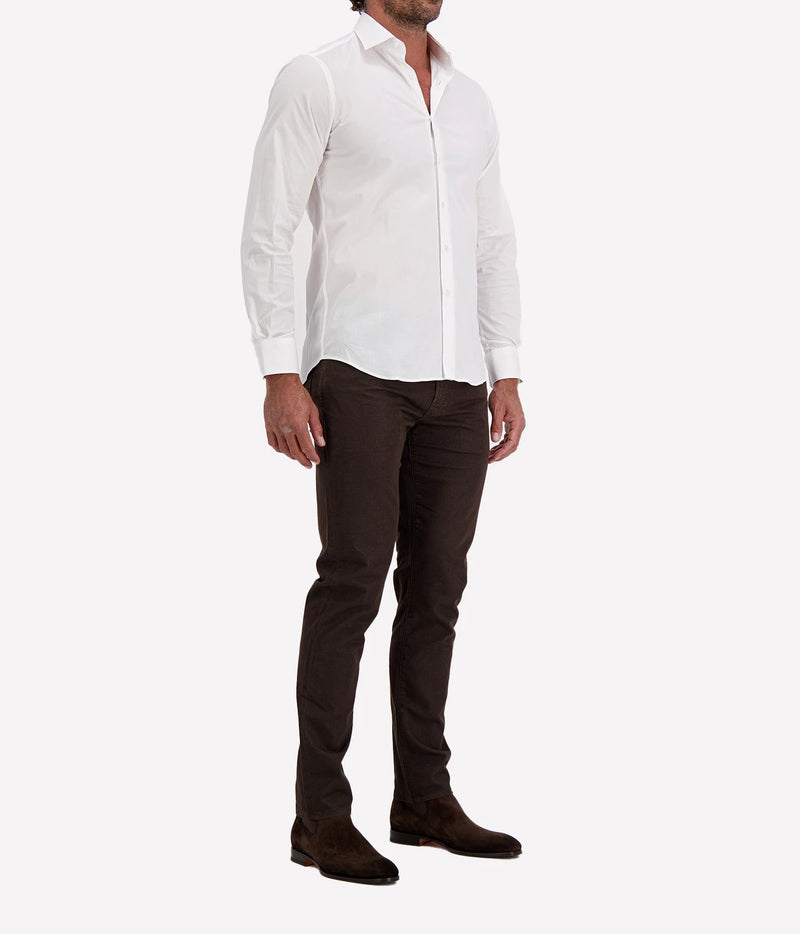 Man wearing Ingram Slim Fit Shirt in White with dark brown trousers and dark brown shoes, three-quarter view