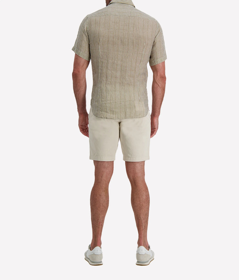 Back view of man wearing Osvaldo Trucchi Linen Short Sleeve Shirt in Olive and White Stripe with stone shorts and white sneakers