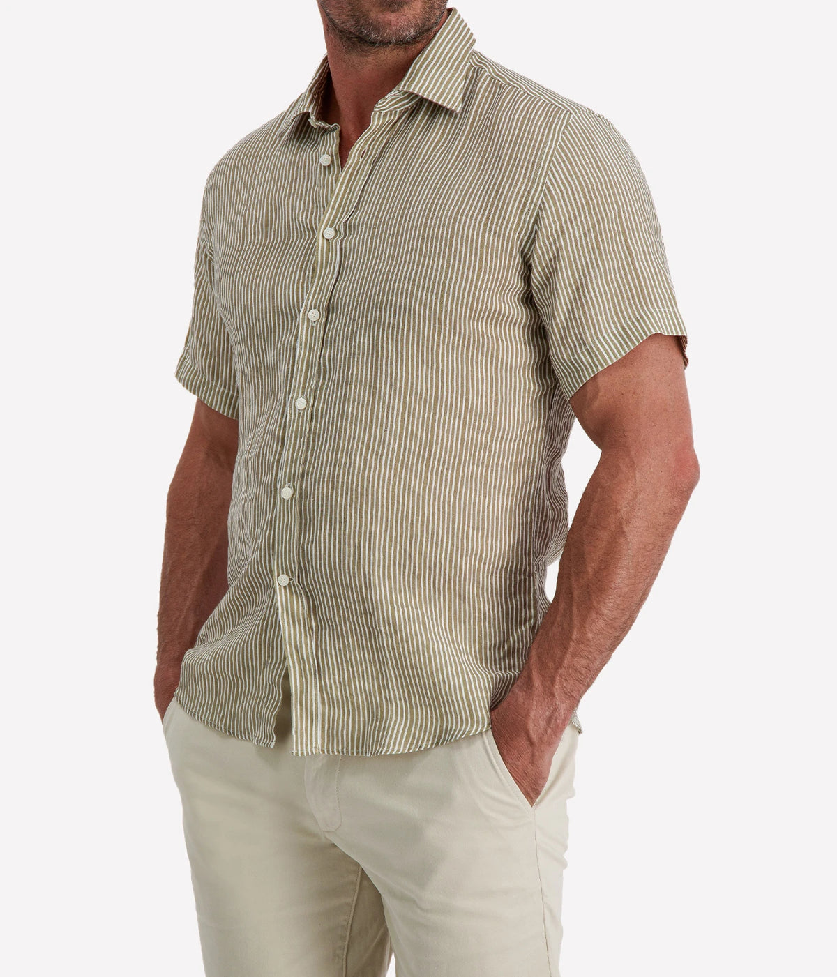 Man wearing Osvaldo Trucchi Linen Short Sleeve Shirt in Olive and White Stripe with stone shorts, cropped front view with hand in pocket