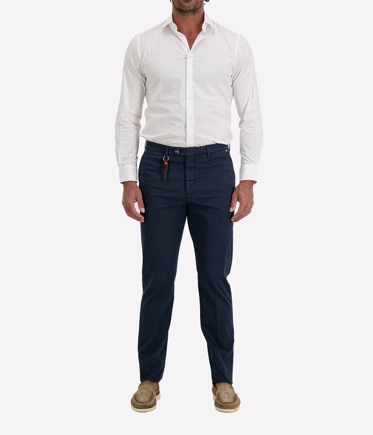 Man wearing Marco Pescarolo New York Cotton Silk Trouser in Navy with a white shirt and tan suede shoes, full-length front view