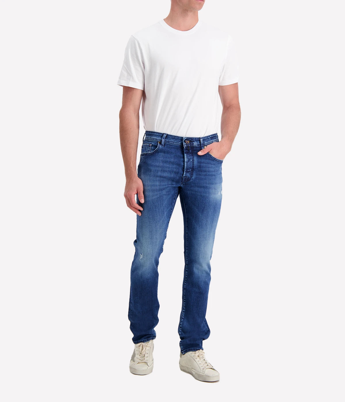 Jacob Cohen's Bard 5-Pocket Jean in a mid-blue wash. Showcasing a mid-rise, slim fit with branded hardware and suede patch detail. A versatile, luxurious jean for both casual and formal occasions.