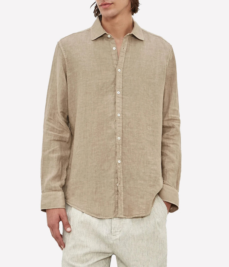 Lightweight linen shirt with a soft collar, embroidered detailing, and a refined fit.