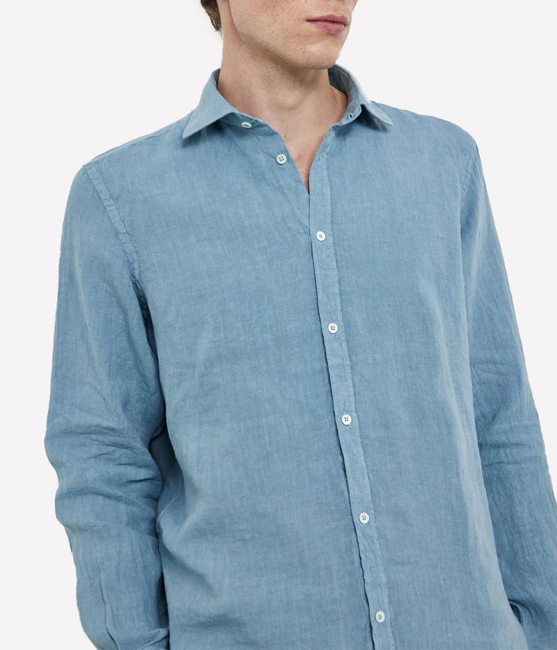 Lightweight linen shirt with a soft collar, embroidered detailing, and a refined fit.