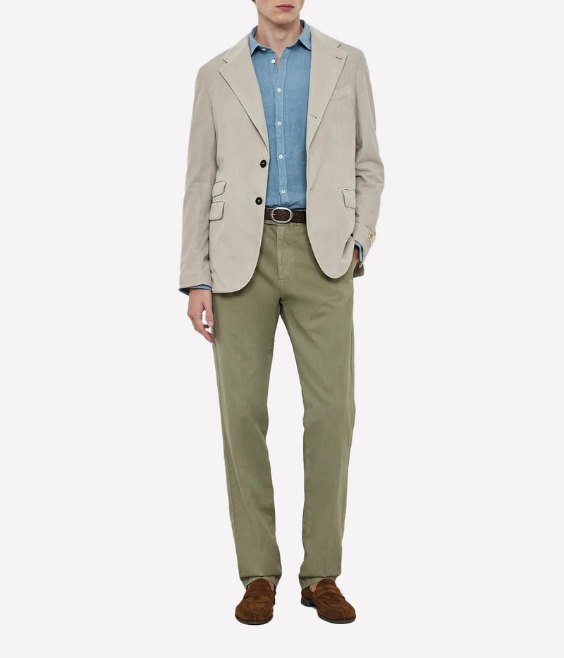 Lightweight linen shirt with a soft collar, embroidered detailing, and a refined fit.