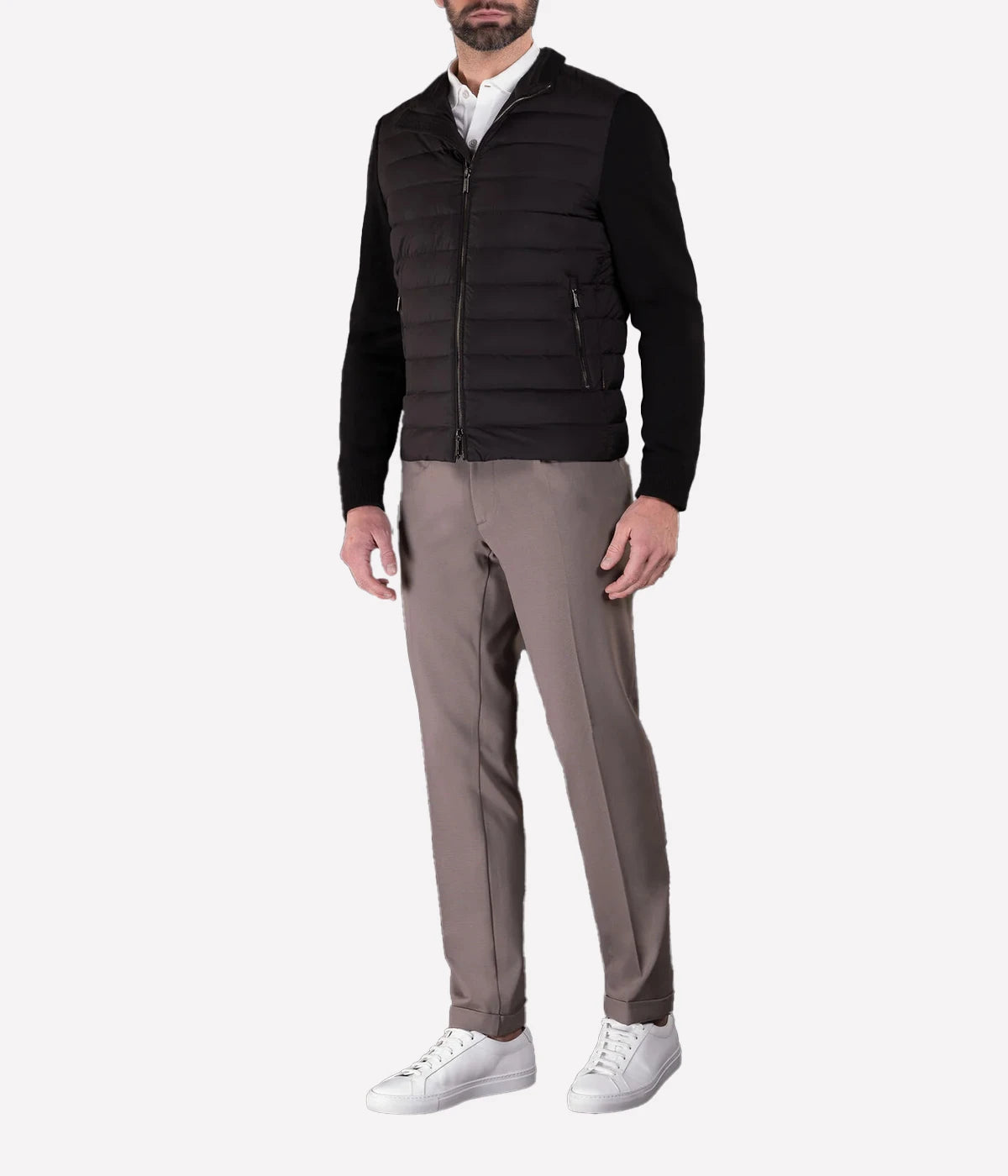 Cattaneo Jacket in a sleek, lightweight design, featuring quilted goose down padding, a ribbed collar, rib-knit lined sleeves, and a two-way metal zip closure. Crafted from water-repellent fabric with cotton knit panels, finished with vertical zip side pockets and internal document pockets. Made in Italy.