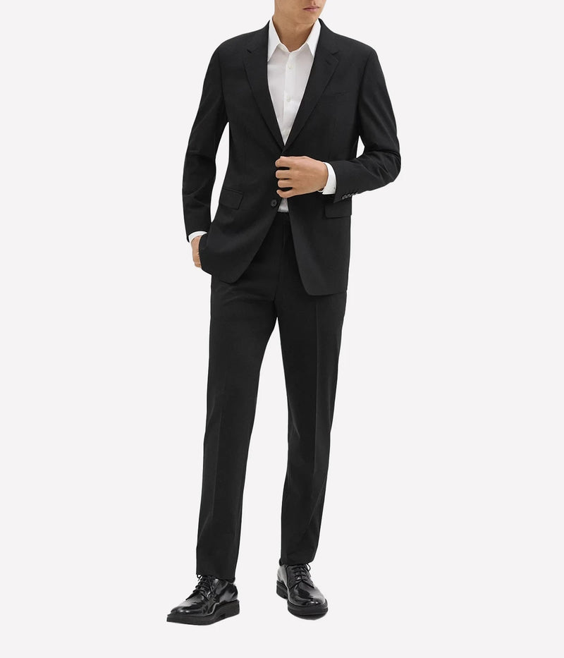 Chambers Blazer by Theory, crafted from luxurious Italian virgin wool and Lycra Spandex. Features a structured fit, classic notch lapels, chest and flap pockets, and buttoned cuffs. Fully lined, wrinkle-resistant, and moisture-controlling fabric, perfect for both professional and casual wear