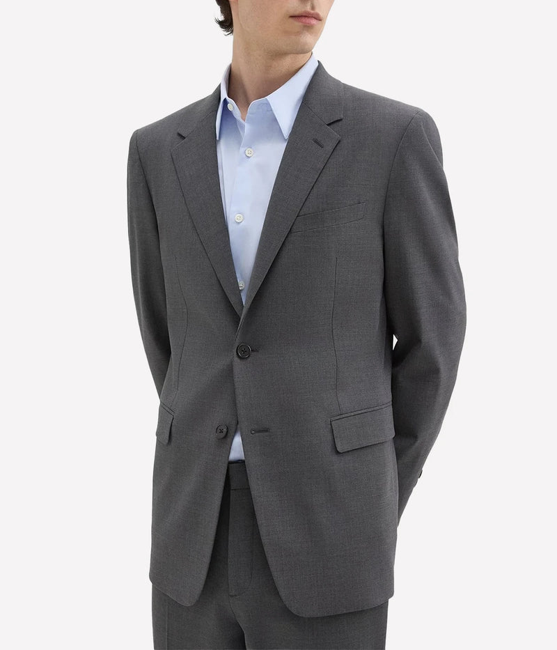 Chambers Blazer by Theory, crafted from medium-weight Italian virgin wool and Lycra Spandex. Features structured tailoring with notch lapels, chest and flap pockets, and buttoned cuffs. Fully lined with two interior pockets, wrinkle-resistant and moisture-controlling fabric.