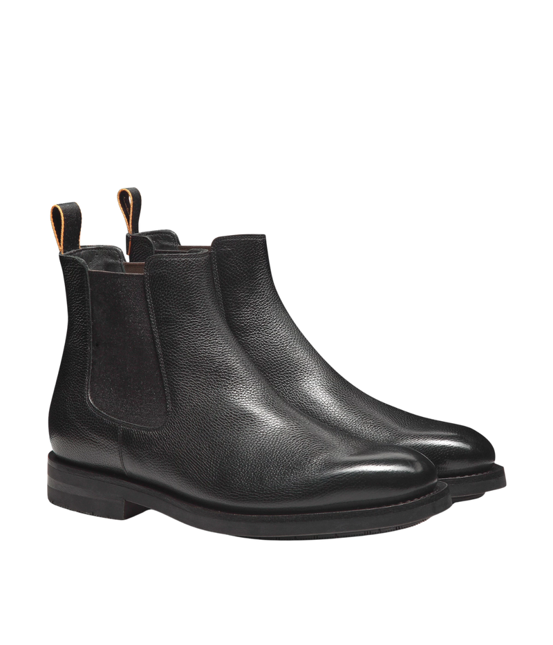 Men’s black leather Chelsea boots with elastic side panels, pull tab, and durable rubber sole by Santoni.