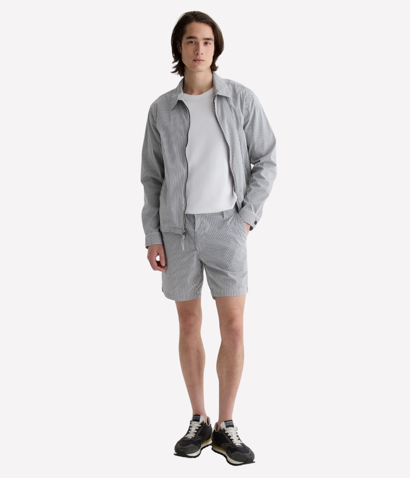 AG Cipher Short in Charcoal Stripe made from stretch seersucker, featuring a mid-rise waist, slim fit, and refined striped finish.