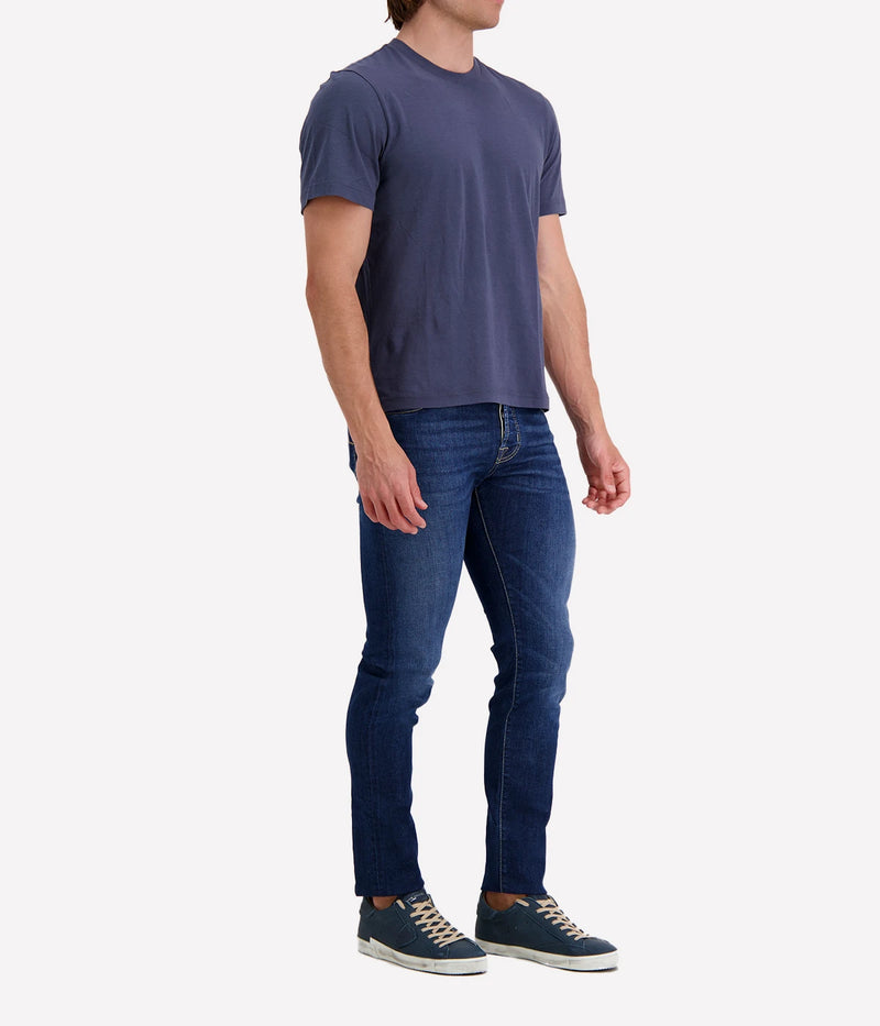 The Clean Finish Jersey Short Sleeve Crew in luxurious jersey fabric, designed for a classic fit. Featuring a binded neck and clean finished hem, this timeless t-shirt is the perfect addition to elevate any wardrobe. Ideal for casual or smart-casual outfits, this versatile piece offers effortless style and durability.