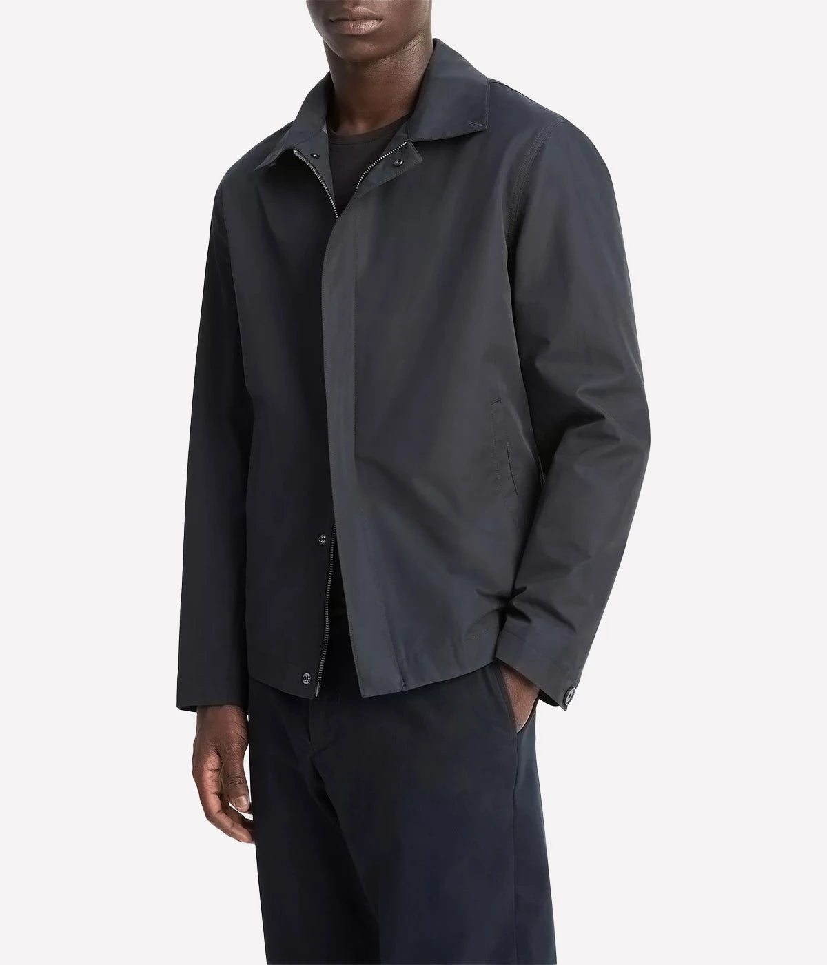 Vince men’s lightweight cotton-blend jacket in a soft peached finish with convertible collar, zip and snap front, and gusseted back for movement.