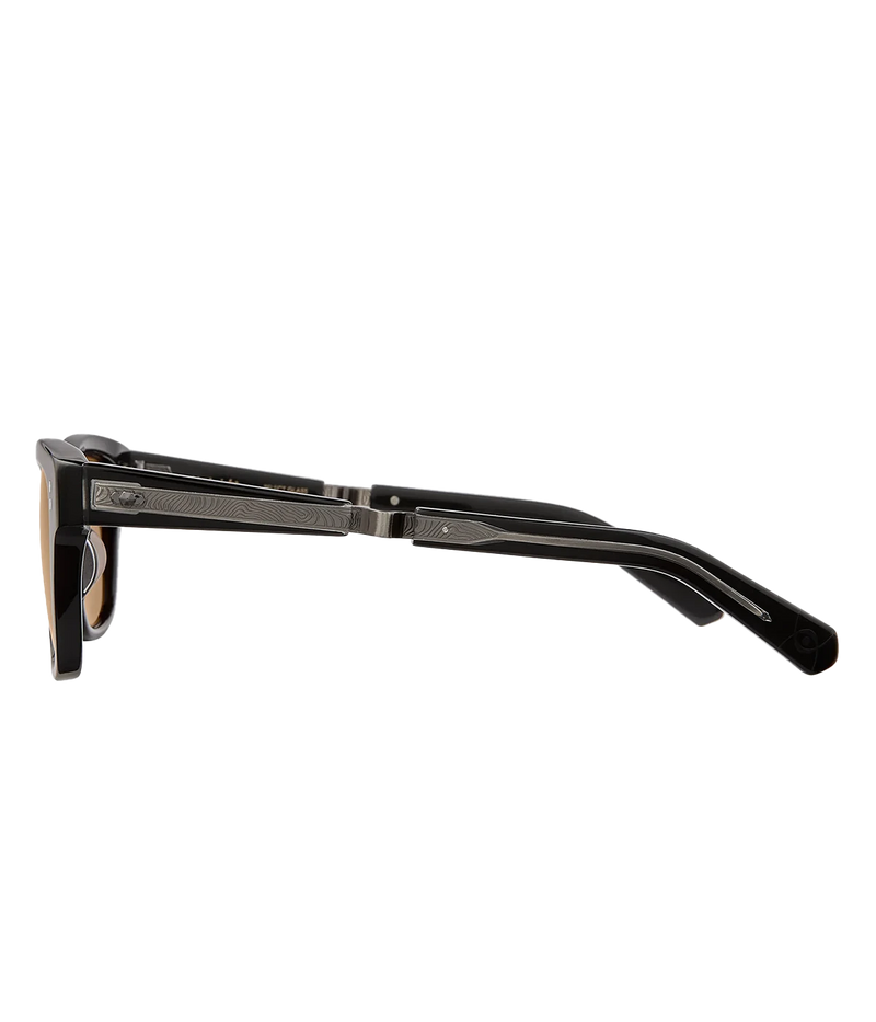 The Damone sunglasses combine classic wayfarer style with a distinct top line. Made with premium glass lenses, custom engraved metal core wire, and a titanium coil temple for comfort. Handcrafted in Japan, these sunglasses offer 100% UV protection and feature the Mr. Leight logo and custom details for a sophisticated touch.