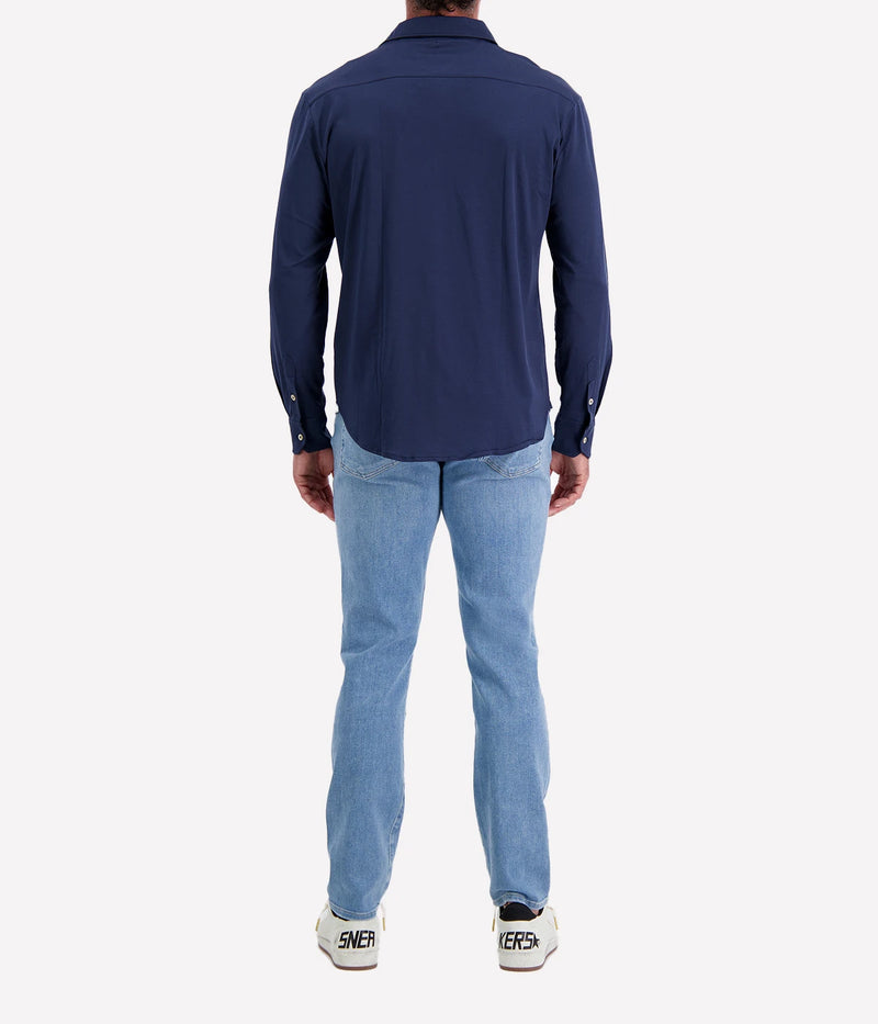 Refined Dandy Shirt in soft jersey cotton with cutaway collar, front button fastening, and long sleeves with buttoned cuffs. Perfect for smart-casual styling.