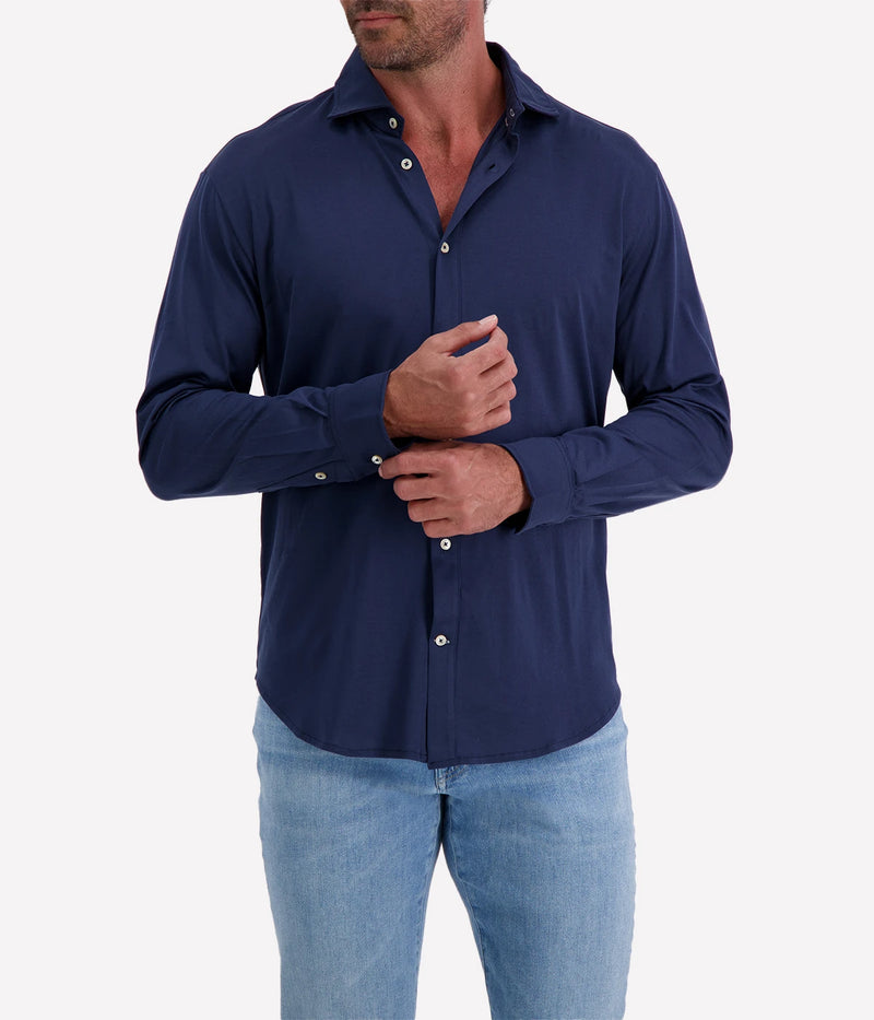 Refined Dandy Shirt in soft jersey cotton with cutaway collar, front button fastening, and long sleeves with buttoned cuffs. Perfect for smart-casual styling.