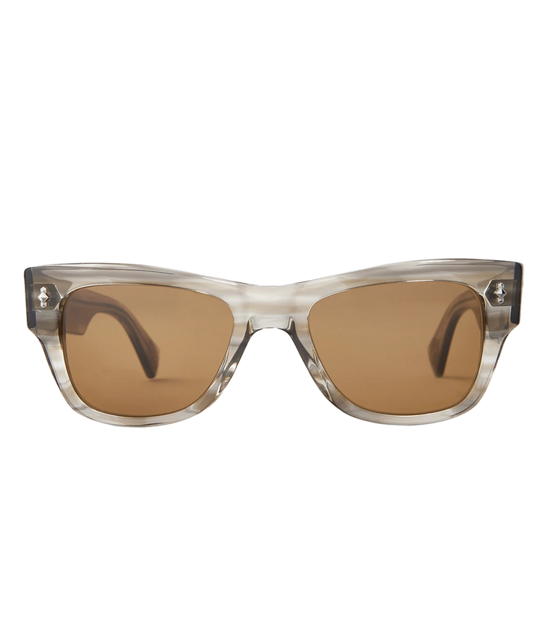 The Duke sunglasses feature bold, thick acetate with Shark Teeth filigree and Fish Hook metal accents. Made with premium materials, including Mr. Leight Select Glass lenses and nickel silver core wire. Handcrafted in Japan, these sunglasses offer 100% UV protection in a modern, classic style.
