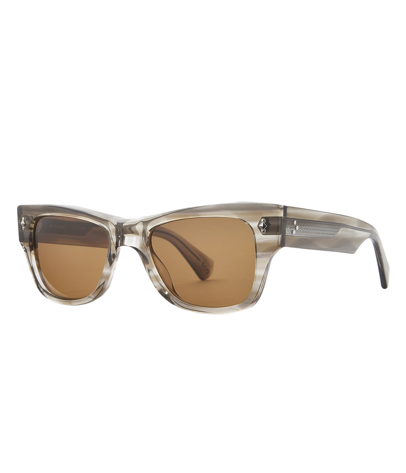 The Duke sunglasses feature bold, thick acetate with Shark Teeth filigree and Fish Hook metal accents. Made with premium materials, including Mr. Leight Select Glass lenses and nickel silver core wire. Handcrafted in Japan, these sunglasses offer 100% UV protection in a modern, classic style.