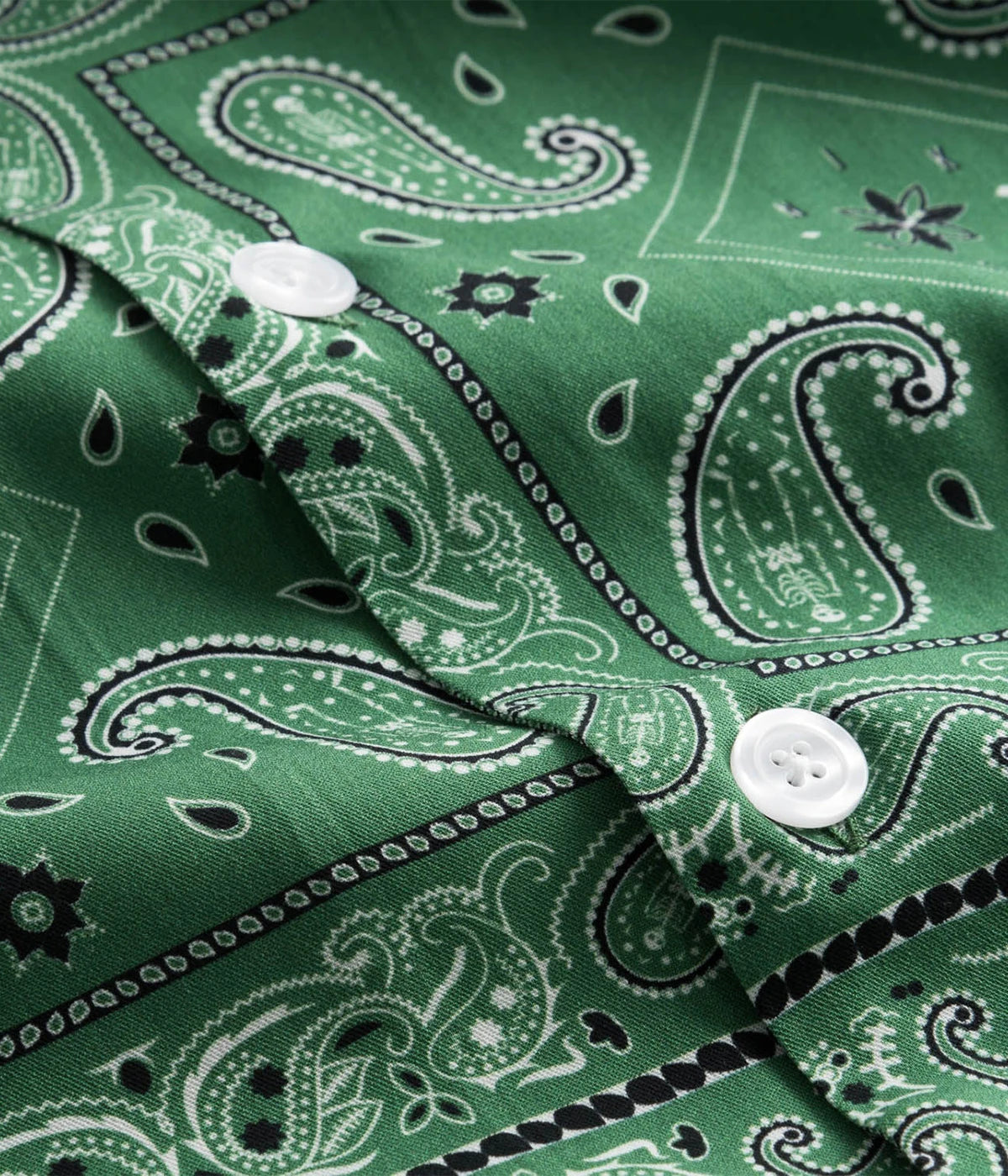 Multicoloured graphic-patterned short-sleeved vacation shirt with a button-down collar and relaxed fit, crafted from breathable Tencel material. Made in Portugal.