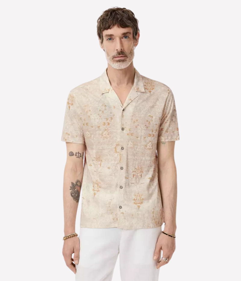 Camp collar shirt with a vintage Persian rug print, featuring short sleeves, a concealed button placket, and antiqued brushed metal buttons.