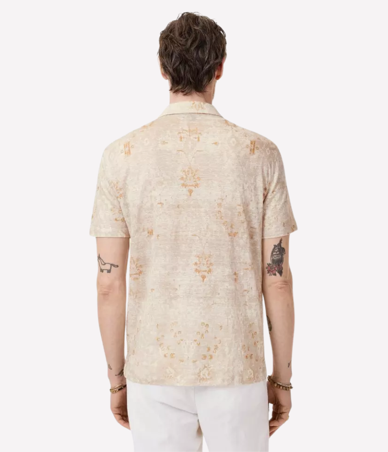 Camp collar shirt with a vintage Persian rug print, featuring short sleeves, a concealed button placket, and antiqued brushed metal buttons.
