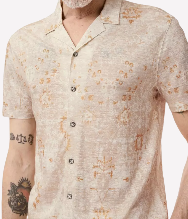 Camp collar shirt with a vintage Persian rug print, featuring short sleeves, a concealed button placket, and antiqued brushed metal buttons.
