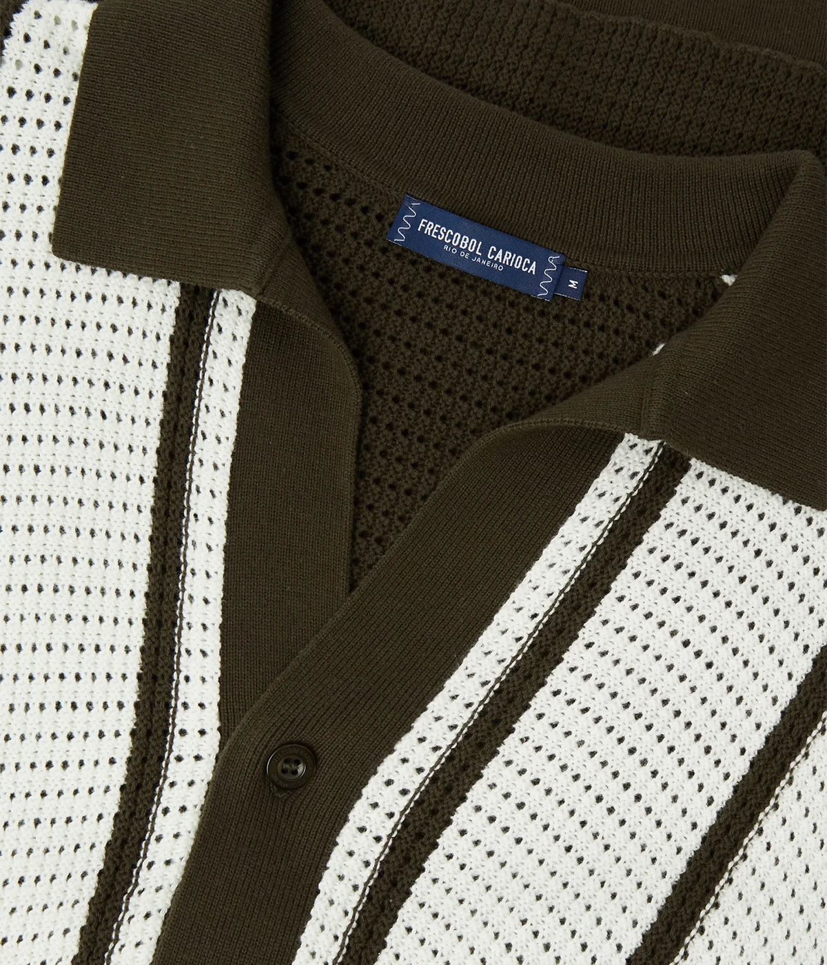Fabricio Cardigan in 100% cotton with a pointelle knit and striped design. Featuring a relaxed fit, open collar, button-up front with branded mother-of-pearl buttons, front patch pockets, and ribbed hem and cuffs.
