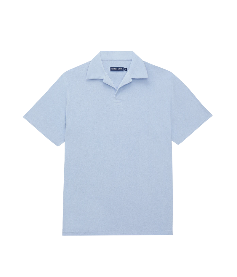 blue short sleeve cotton terry polo with an open collar and half placket.