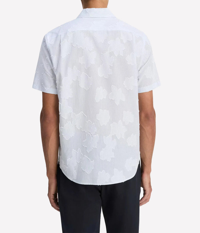 Vince men’s button-up shirt with fil coupé floral pattern layered on striped cotton, featuring a shirttail hem and pleated back.